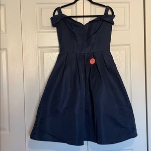 Off the shoulder navy dress.